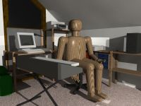Computerecke mit Holzfigur